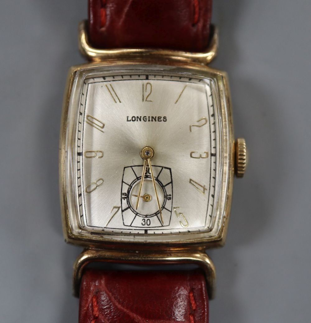 A ladys 1950s? 10k gold filled Longines manual wind wrist watch, on later associated strap.